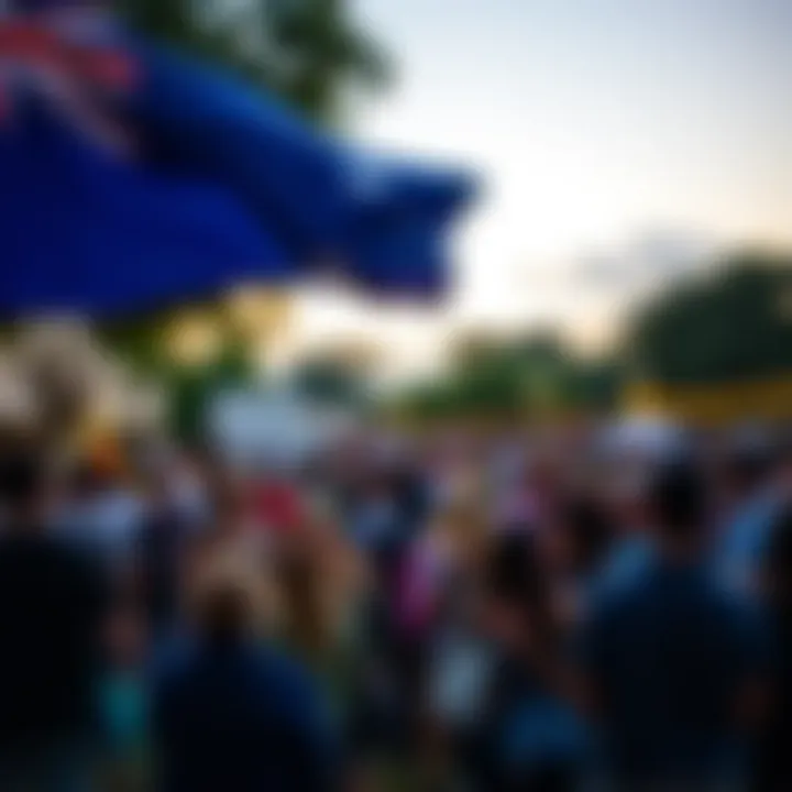Australian flag waving over a diverse community gathering in a public park